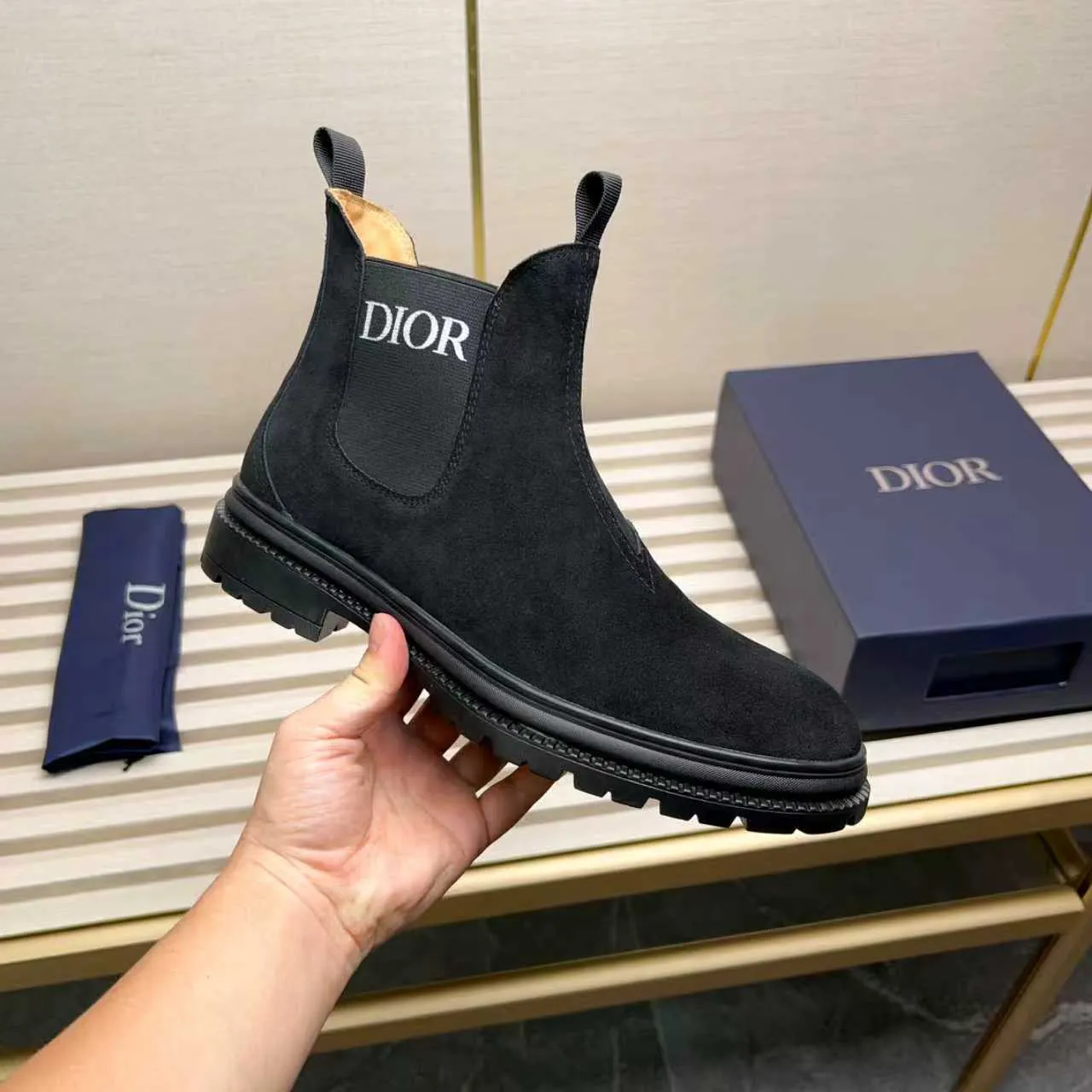 Men's Shoes 💰480 Dior A practical choice that combines protection with classic style. Made from durable Rugged Calf leather, it's tumbled and hand-finished to create a soft suede feel with a rich texture. Elastic side panels and subtle cutouts are inspired by the classic Chelsea boot. Leather upper and lining with Kummel tabs at front and rear, rubber outsole